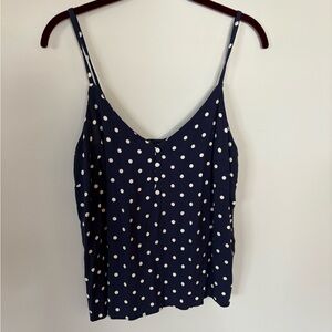 Women’s polka dot shirt.